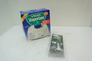 lot 106 image: Vicks Vaporizer and Toilet Tank Repair Kit