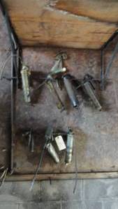 Seven grease guns