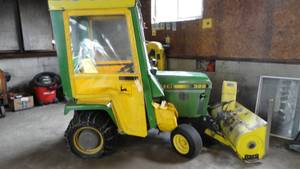 John Deere Model 322 with Deck & Snowblower, Tire Chains, Wheel weights, & Cab