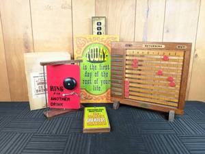 A Variety of Bar Decor, Inandout Register and Wall Signs
