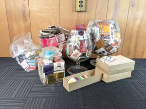 A Large Collection of Matchbooks and Large Containers