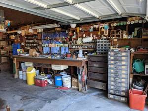 Garage Full of Remington 11-Drawer Cabinet, Extension Cords, Trash Bags, Socket Sets, Wrenches, Paint Brushes, Screws, Chain, Flat Head Screw Drivers, Garden Tools, Buckets, Bolts, Cooler, Light Fixtures and Much More