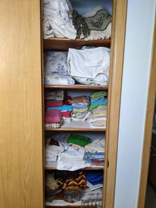 Assortment of Quilted Comforter, Towels, Aprons, Pillow Cases, Throw Pillows, Blankets, Etc.