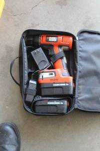 lot 215 image: Black & Decker BDGL1800 10mm 18V Drill with (2) Batteries, Charger, Soft Side Carry Bag