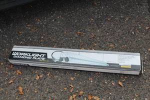lot 221 image: Lithonia Lighting 1241DP Diamond Plate Worklight (New )
