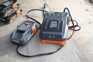 lot 308 image: Ridgid 18V Cordless Tool Battery and Charger