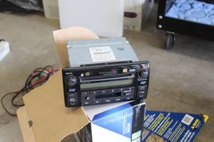 lot 380 image: JBL Toyota FMAM Radio Receiver 6 Disc Changer