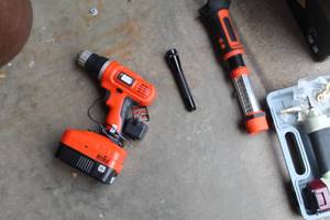lot 417 image: Black & Decker Cordless DrillBattery and Light with Mini Mag Light Flashlight