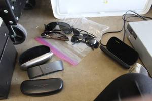 lot 483 image: Lot of  Sunglasses and Sunglass Cases