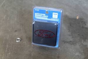 lot 517 image: Ford Hitch Cover Brake Light (in )