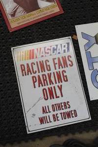 lot 596 image: NASCAR Racing Fans Parking Only Metal Sign