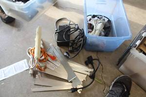 lot 532 image: Lot of (2 Bins) Shelving Brackets, Power Strips, Misc. Power Cords