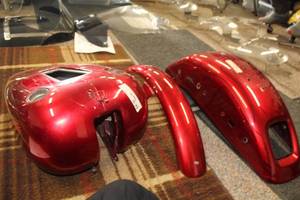 lot 49 image: Harley-Davidson Custom Painted Motorcycle Parts - Front and Rear Fenders, Gas Tank