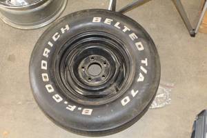 lot 11 image: BF Goodrich Belted TA 70 G70-14 Tire with 14 5-lug Steel Rim
