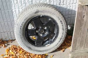 lot 12 image: Goodyear Fortera HL P24565R17 Tire with 17 5-lug Rim