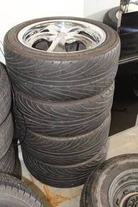lot 7 image: Lot of (4) Yokahama P23545ZR17 Tires with TSW 17 5-lug Rim