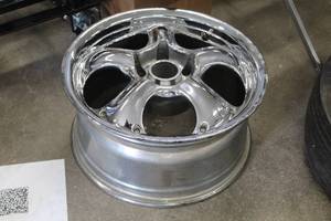 lot 12A image: Tire with 18 5-lug Rim