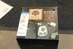 lot 633 image: Harley-Davidson 69166-01B Motorcycle Bar & Shield Horn Cover