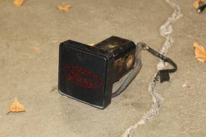 lot 675 image: Ford Hitch Cover Brake Light