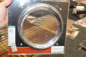 lot 769 image: Harley-Davidson 69733-05 Head Lamp Trim Ring With Visor