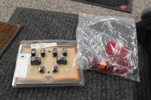 lot 756 image: Lot of (2) Harley-Davidson Motorcycle Switch Caps and Bag Of Accessories