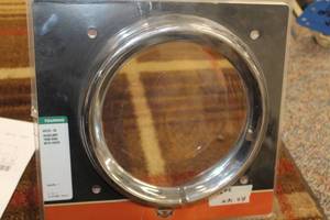 lot 766 image: Harley-Davidson 69733-05 Head Lamp Trim Ring With Visor