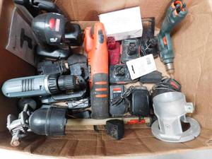 lot 222 image: box of drill. Lights . Batteries and chargers