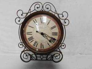 lot 223 image: Real fur, pictures , vase, candle holders. Cross and clock