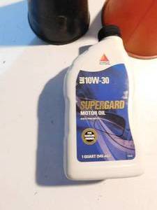 lot 295 image: 2 Oil Funnels, Bottle of Supergard 10W-30