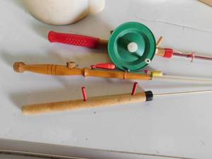lot 107 image: 3 ice fishing rods-1 reel, 2 minnow buckets, 1 battery box