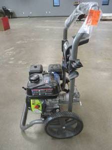 lot 817 image: RYOBI 2900 PSI 2.5 GPM Cold Water Gas Pressure Washer, RY802925VNM - StartsRuns - Missing Tips, Wand and Hose.