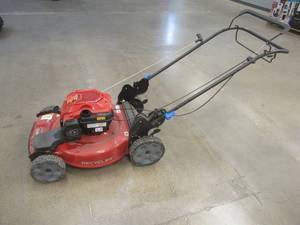 lot 820 image: Toro 22 in. Recycler Briggs & Stratton High Wheel FWD Gas Walk Behind Self Propelled Lawn Mower, 21445 - Could Not Start, Missing Gas Cap and Handles do not click into place well. - Needs Work.