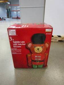 lot 771 image: HOME ACCENTS HOLIDAY 3ft Warm White LED Teddy Bear Nutcracker Holiday Yard Decoration (BOX IS A LITTLE DAMAGED)