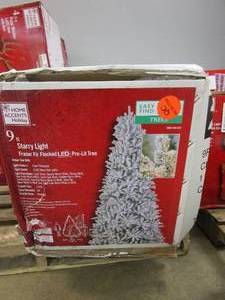 lot 773 image: HOME ACCENTS HOLIDAY 9 ft Starry Light Flocked Christmas Tree (BOX IS DAMAGED, DOES NOT APPEAR TO HAVE AFFECTED TREE)