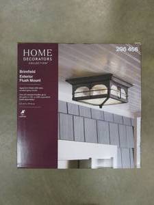 lot 758 image: HOME DECORATORS COLLECTION Brimfield 11 in. Aged Iron 2 Light Outdoor Ceiling Flush Mount Light with Clear Seedy Glass Shade (SOME BOX DAMAGE, APPEARS TO BE BRAND NEW)