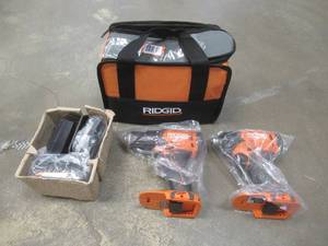 lot 912 image: RIDGID 18V Cordless 2-Tool Combo Kit with 12 in. DrillDriver, 14 in. Impact Driver, (2) 2.0 Ah Batteries, Charger, and Bag, R9272 - Like New