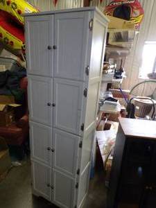 lot 44 image: 4 Door Cabinet