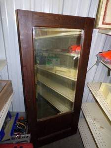 lot 53 image: Antique Wood Cabinet Door with Bevel Edge Mirror