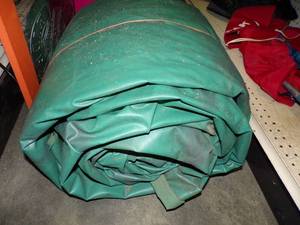 lot 63 image: Large Tarp may have holes great for woodpile Green