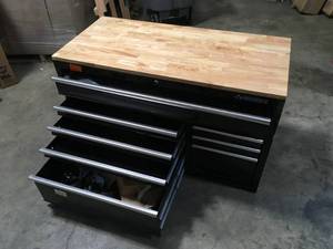 Husky 52 in. W x 25 in. D Standard Duty 9-Drawer Mobile Workbench Tool Chest with Solid Wood Top in Gloss Black Customer Returns See Terms on Auction