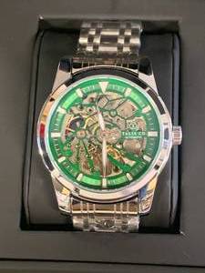 lot 14 image: New Talis Co. 7820 Automatic Watch $686 retail