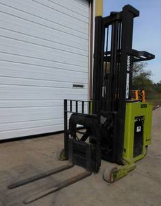 lot 11 image: Clark NP20 Narrow Aisle Electric Stand Up Reach Truck
