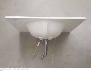 lot 48 image: White Marble Vanity Top with Delta Faucet & Hoses