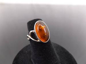lot 63 image: .925 Sterling Silver Amber Cabochon Ring Size 4.75