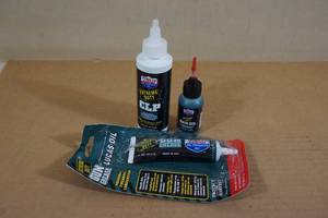 lot 32 image: Lucas Extreme Duty Gun Oil and Cleaner