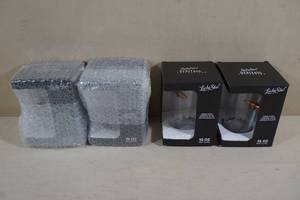 lot 39 image: 4 Lucky Shot 16 Oz Pint Glasses - Embedded Bullet