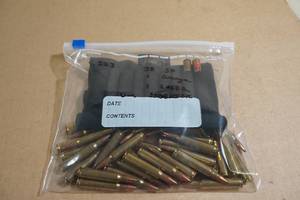 lot 81 image: Loose .223 Rem Rounds - PSP, Orange, Laser Round, Uncle Mikes Sidekick