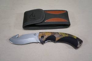 lot 150 image: Sarge Ducks Unlimited Folding Pocket Knife with Gut Hook and Sheath