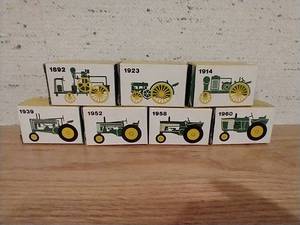 lot 96 image: (7) Mini Die-Cast John Deere Tractors in Boxes