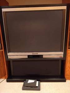 lot 125 image: Large TV & Ralph Engelstad Arena VHS Tapes